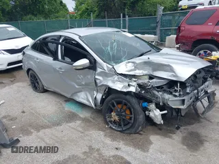 2016 Ford Focus SE z VIN 1FADP3F22GL373756, wystawiony jako IAAI lot #42369795 z przebiegiem 99 646 mil mil oraz . Historia ofert i sprzedaży dostępna na DreamBid. Obrazek 1.