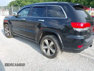 2016 Jeep Grand Cherokee Overland with VIN 1C4RJFCG3GC417699, listed as a IAAI auction lot 42419054 with 109,911 mi miles and . Bid and sale history available at DreamBid. Image 3.