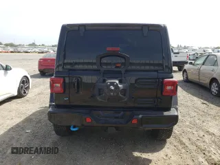 2022 Jeep Wrangler Unlimited Sahara with VIN 1C4JJXP60NW172991, listed as a Copart auction lot 54272305 with 54,361 mi miles and Salvage title. Bid and sale history available at DreamBid. Image 6.