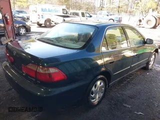 2000 Honda Accord EX z VIN 1HGCG6674YA149566, wystawiony jako IAAI lot #41368271 z przebiegiem 262 505 mil mil oraz . Historia ofert i sprzedaży dostępna na DreamBid. Obrazek 4.