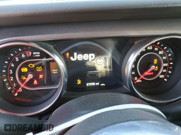 2020 Jeep Gladiator Mojave z VIN 1C6JJTEG1LL209606, wystawiony jako Copart lot #88265265 z przebiegiem 57 098 mil mil oraz Szkoda całkowita • Salvage title. Historia ofert i sprzedaży dostępna na DreamBid. Obrazek 9.