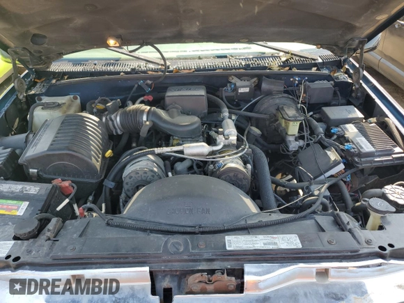 1999 GMC Suburban z VIN 3GKFK16R2XG544767, wystawiony jako Copart lot #67078414 z przebiegiem 154 145 mil mil oraz Szkoda całkowita • Salvage title. Historia ofert i sprzedaży dostępna na DreamBid. Obrazek 12.