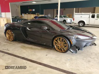 2023 McLaren GT z VIN SBM22GCAXPW002692, wystawiony jako Copart lot #41496504 z przebiegiem Nie podano mil oraz . Historia ofert i sprzedaży dostępna na DreamBid. Obrazek 4.