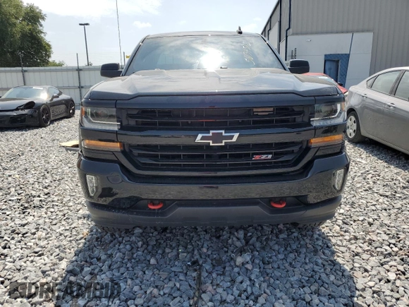 2018 Chevrolet Silverado 1500 LT with VIN 2GCVKRECXJ1107425, listed as a Copart auction lot 56134595 with 108,849 mi miles and Salvage Title. Bid and sale history available at DreamBid. Image 5.