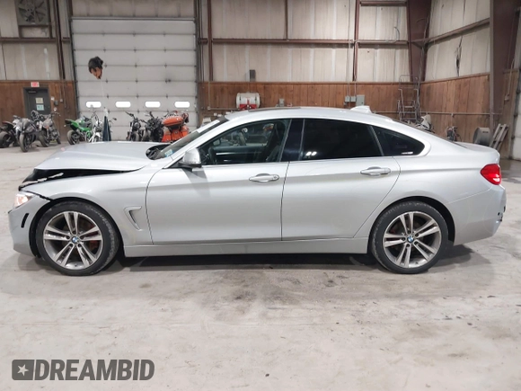 2016 BMW 4 Series 428i xDrive with VIN WBA4C9C5XGG138843, listed as a IAAI auction lot 41747358 with 63,804 mi miles and . Bid and sale history available at DreamBid. Image 14.