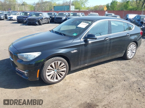 2014 BMW 5 Series GT 535i Gran Turismo xDrive with VIN WBA5M4C56ED183815, listed as a IAAI auction lot 42155348 with 150,357 mi miles and . Bid and sale history available at carsss.com. Image 2.