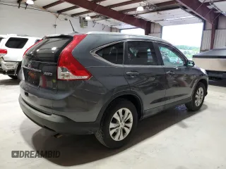 2013 Honda CR-V EX-L z VIN 2HKRM4H72DH628073, wystawiony jako Copart lot #57082375 z przebiegiem 157 511 mil mil oraz Czysty tytuł • Clean title. Historia ofert i sprzedaży dostępna na DreamBid. Obrazek 3.