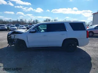 2020 Chevrolet Tahoe Commercial with VIN 1GNSKDEC2LR217697, listed as a IAAI auction lot 40815499 with 128,503 mi miles. Bid and sale history available at carsss.com. Image 14.