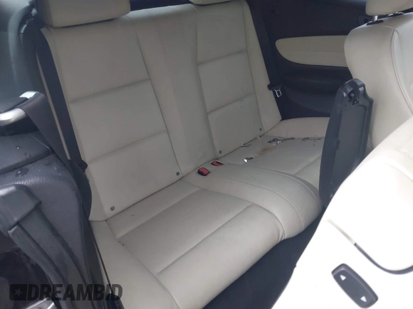 2011 BMW 1 Series 128i with VIN WBAUL7C52BVM79176, listed as a IAAI auction lot 41387249 with 99,145 mi miles and . Bid and sale history available at carsss.com. Image 8.
