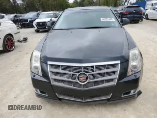 2009 Cadillac CTS AWD w/1SA with VIN 1G6DH577590123416, listed as a Copart auction lot 48297495 with 142,728 mi miles and Salvage Title. Bid and sale history available at carsss.com. Image 5.