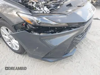 2025 Toyota Camry LE with VIN 4T1DAACKXSU541257, listed as a IAAI auction lot 42052246 with 13,585 mi miles and . Bid and sale history available at DreamBid. Image 6.