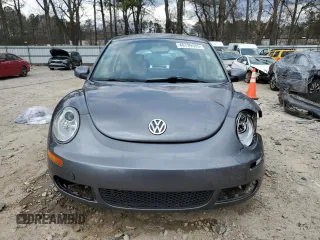 2007 Volkswagen Beetle with VIN 3VWPW31CX7M504745, listed as a Copart auction lot 48799535 with 128,267 mi miles and Salvage Title. Bid and sale history available at DreamBid. Image 5.