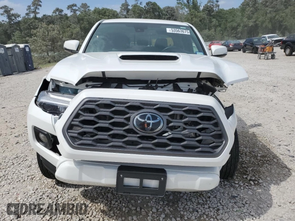 2023 Toyota Tacoma SR5 z VIN 3TMAZ5CN2PM217085, wystawiony jako Copart lot #53563675 z przebiegiem 7 389 mil mil oraz Szkoda całkowita • Salvage title. Historia ofert i sprzedaży dostępna na DreamBid. Obrazek 5.