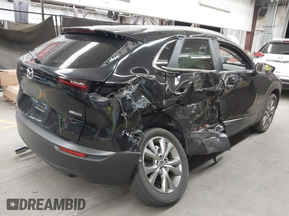 2024 Mazda CX-30 2.5 S Preferred Package with VIN 3MVDMBCM9RM612190, listed as a IAAI auction lot 41721765 with 8,757 mi miles. Bid and sale history available at carsss.com. Image 4.