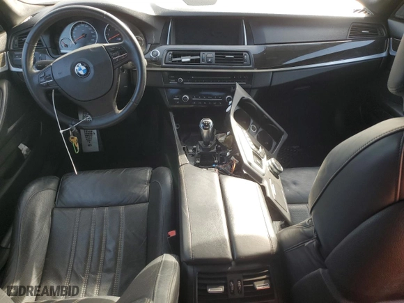 2014 BMW M5 with VIN WBSFV9C56ED097642, listed as a Copart auction lot 77905514 with 77,022 mi miles and Salvage Title. Bid and sale history available at carsss.com. Image 8.
