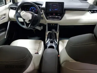2023 Toyota Corolla Cross XLE with VIN 7MUDAABG9PV074996, listed as a Copart auction lot 47436105 with 21,766 mi miles and Salvage title. Bid and sale history available at DreamBid. Image 8.