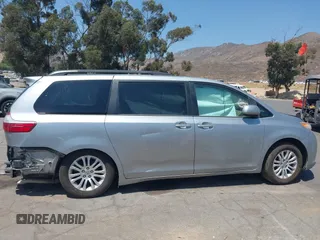 2015 Toyota Sienna XLE with VIN 5TDYK3DC0FS589947, listed as a IAAI auction lot 36567379 with 130,969 mi miles and . Bid and sale history available at DreamBid. Image 14.