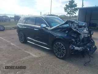 2020 Lincoln Aviator Black Label with VIN 5LM5J9XC3LGL30811, listed as a IAAI auction lot 42611207 with 64,893 mi miles and . Bid and sale history available at DreamBid. Image 1.