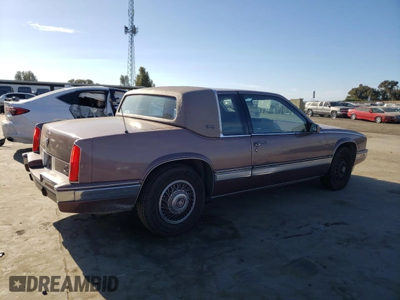 1988 Cadillac Eldorado with VIN 1G6EL1153JU632470, listed as a Copart auction lot 78507684 with 176,894 mi miles and Salvage Title. Bid and sale history available at DreamBid. Image 3.