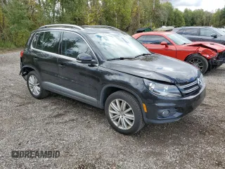 2017 Volkswagen Tiguan with VIN WVGMV7AX2HK031639, listed as a Copart auction lot 72950744 with 109,445 mi miles and Salvage title. Bid and sale history available at DreamBid. Image 4.