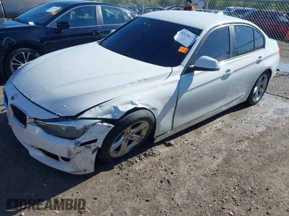2015 BMW 3 Series 320i with VIN WBA3B1G57FNT02019, listed as a IAAI auction lot 42128277 with 218,621 mi miles and . Bid and sale history available at DreamBid. Image 6.