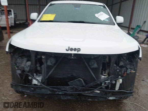 2018 Jeep Grand Cherokee Altitude with VIN 1C4RJFAG4JC320599, listed as a IAAI auction lot 42182661 with 70,957 mi miles and . Bid and sale history available at DreamBid. Image 6.