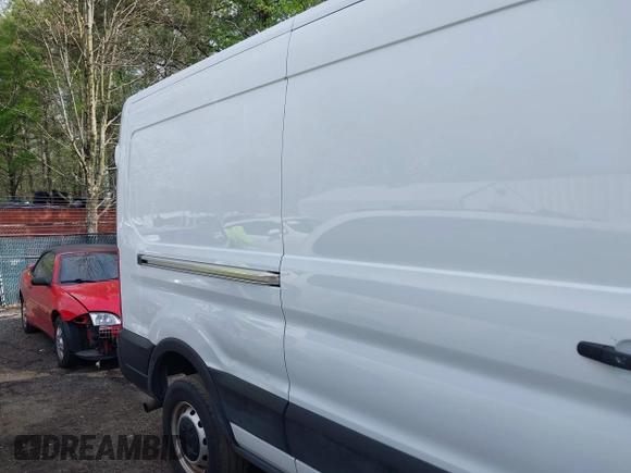 2021 Ford Transit Cargo with VIN 1FTBR1C85MKA48173, listed as a IAAI auction lot 42005472 with 81,980 mi miles and . Bid and sale history available at DreamBid. Image 6.