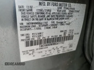 2008 Mercury Sable с VIN 1MEHM40W88G617702, выставлен на аукционе Copart как лот 72220634 с пробегом 214 661 миль миль и Списание • Salvage title. История ставок и продаж доступна на DreamBid. Изображение 12.