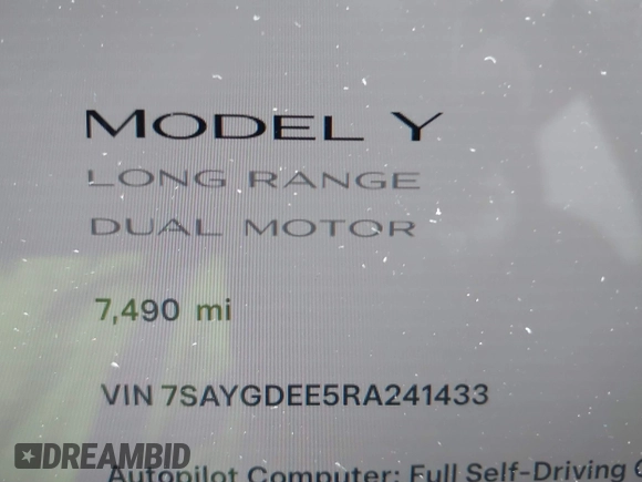 2024 Tesla Model Y Long Range with VIN 7SAYGDEE5RA241433, listed as a IAAI auction lot 41569277 with 7,490 mi miles. Bid and sale history available at carsss.com. Image 7.