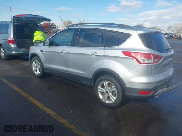 2014 Ford Escape SE with VIN 1FMCU9GX9EUB98758, listed as a IAAI auction lot 41717257 with 126,358 mi miles. Bid and sale history available at carsss.com. Image 3.