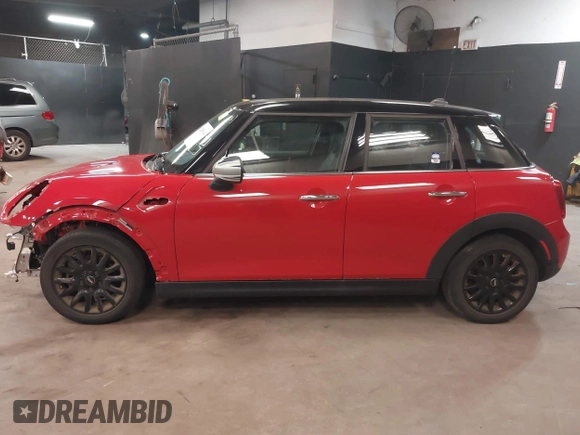 2019 MINI Hardtop 4 Door Cooper with VIN WMWXU1C57K2J02108, listed as a IAAI auction lot 42285864 with 19,383 mi miles and . Bid and sale history available at DreamBid. Image 15.