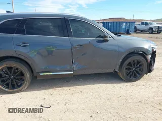 2022 Mazda CX-9 Grand Touring with VIN JM3TCBDY6N0613996, listed as a IAAI auction lot 41018105 with 58,110 mi miles. Bid and sale history available at carsss.com. Image 6.
