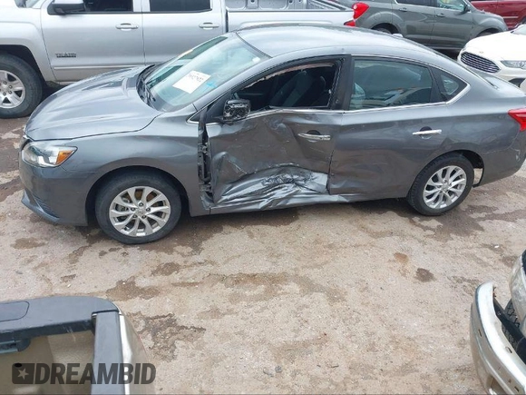 2019 Nissan Sentra S with VIN 3N1AB7AP9KY415350, listed as a IAAI auction lot 41059859 with 51,416 mi miles and . Bid and sale history available at DreamBid. Image 14.