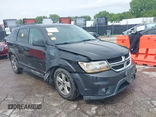 2012 Dodge Journey SXT with VIN 3C4PDDBGXCT185301, listed as a IAAI auction lot 39319960 with 181,086 mi miles and . Bid and sale history available at DreamBid. Image 1.