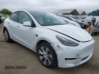 2024 Tesla Model Y with VIN 7SAYGDED4RF055859, listed as a IAAI auction lot 42201099 with 17,373 mi miles and . Bid and sale history available at DreamBid. Image 1.