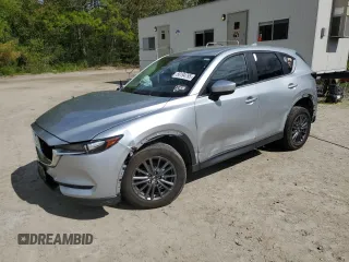 2021 Mazda CX-5 Touring z VIN JM3KFBCM1M0343804, wystawiony jako Copart lot #56194795 z przebiegiem 100 039 mil mil oraz Tytuł czysty. Historia ofert i sprzedaży dostępna na DreamBid. Obrazek 1.