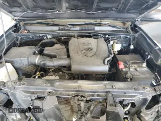 2023 Toyota Tacoma SR z VIN 3TMCZ5AN4PM599664, wystawiony jako Copart lot #57462455 z przebiegiem 65 736 mil mil oraz Szkoda całkowita • Salvage title. Historia ofert i sprzedaży dostępna na DreamBid. Obrazek 11.