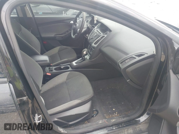 2013 Ford Focus SE with VIN 1FADP3F25DL209199, listed as a IAAI auction lot 42086573 with 136,999 mi miles. Bid and sale history available at carsss.com. Image 5.