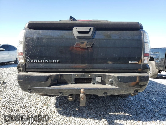 2010 Chevrolet Avalanche LTZ with VIN 3GNNCGE04AG250747, listed as a Copart auction lot 48952615 with 142,136 mi miles and Salvage Title. Bid and sale history available at DreamBid. Image 6.