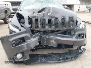 2015 Jeep Cherokee Limited with VIN 1C4PJLDB1FW708157, listed as a IAAI auction lot 41502567 with 85,354 mi miles and . Bid and sale history available at DreamBid. Image 6.
