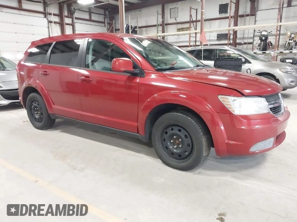 2009 Dodge Journey SXT with VIN 3D4GG57V39T587354, listed as a IAAI auction lot 41989290 with 102,250 mi miles. Bid and sale history available at carsss.com. Image 1.