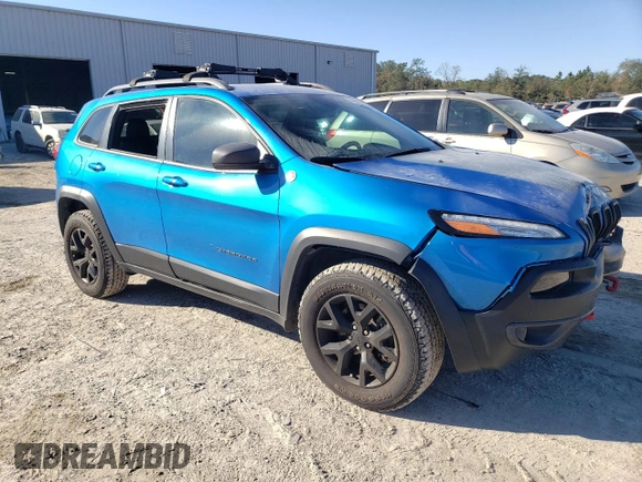 2018 Jeep Cherokee Trailhawk with VIN 1C4PJMBB2JD529915, listed as a Copart auction lot 87686525 with 107,184 mi miles and Salvage Title. Bid and sale history available at carsss.com. Image 4.
