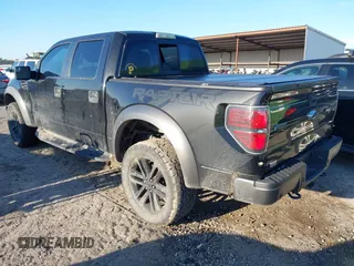 2014 Ford F-150 SVT Raptor with VIN 1FTFW1R60EFC90847, listed as a IAAI auction lot 41823834 with 169,549 mi miles and . Bid and sale history available at carsss.com. Image 3.