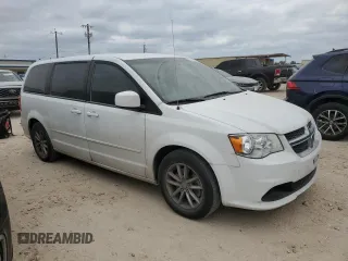 2015 Dodge Grand Caravan SE with VIN 2C4RDGBG3FR636473, listed as a Copart auction lot 53513275 with 128,994 mi miles and Salvage Title. Bid and sale history available at DreamBid. Image 4.