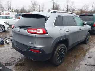 2016 Jeep Cherokee Latitude with VIN 1C4PJLCS8GW363504, listed as a IAAI auction lot 41543553 with 143,278 mi miles. Bid and sale history available at carsss.com. Image 4.