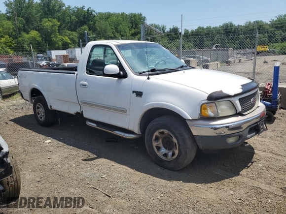 2000 Ford F-150 XL с VIN 1FTPF18L2YNA18807, выставлен на аукционе Copart как лот 62648305 с пробегом Не указан миль и Списание • Salvage title. История ставок и продаж доступна на DreamBid. Изображение 4.