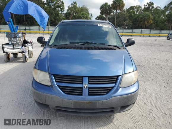 2007 Dodge Caravan SE z VIN 1D4GP25E97B222497, wystawiony jako Copart lot #57701925 z przebiegiem 122 076 mil mil oraz Czysty tytuł • Clean title. Historia ofert i sprzedaży dostępna na DreamBid. Obrazek 5.