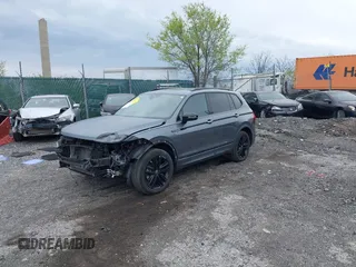 2022 Volkswagen Tiguan SE R-Line Black z VIN 3VVCB7AX9NM014741, wystawiony jako IAAI lot #42043123 z przebiegiem 71 777 mil mil oraz . Historia ofert i sprzedaży dostępna na DreamBid. Obrazek 18.