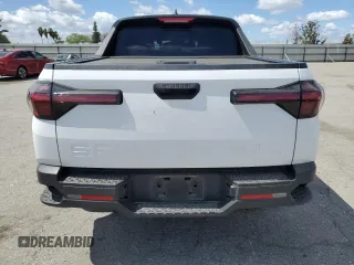 2023 Hyundai Santa Cruz SEL z VIN 5NTJC4AE3PH046045, wystawiony jako Copart lot #51332055 z przebiegiem 50 113 mil mil oraz Szkoda całkowita • Salvage title. Historia ofert i sprzedaży dostępna na DreamBid. Obrazek 6.