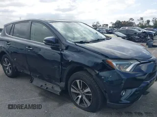 2017 Toyota RAV4 XLE with VIN JTMWFREV3HD105878, listed as a IAAI auction lot 41889338 with 75,784 mi miles. Bid and sale history available at carsss.com. Image 6.